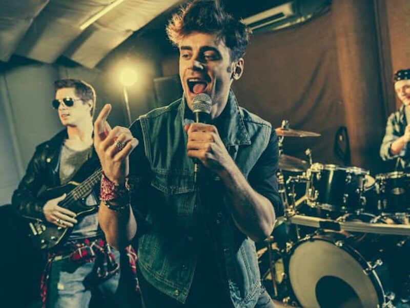 Singer performing with band