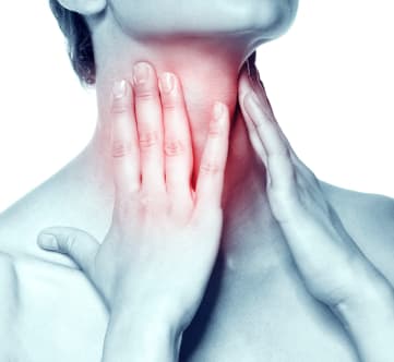 Woman rubbing throat, sore from vocal strain, with hands